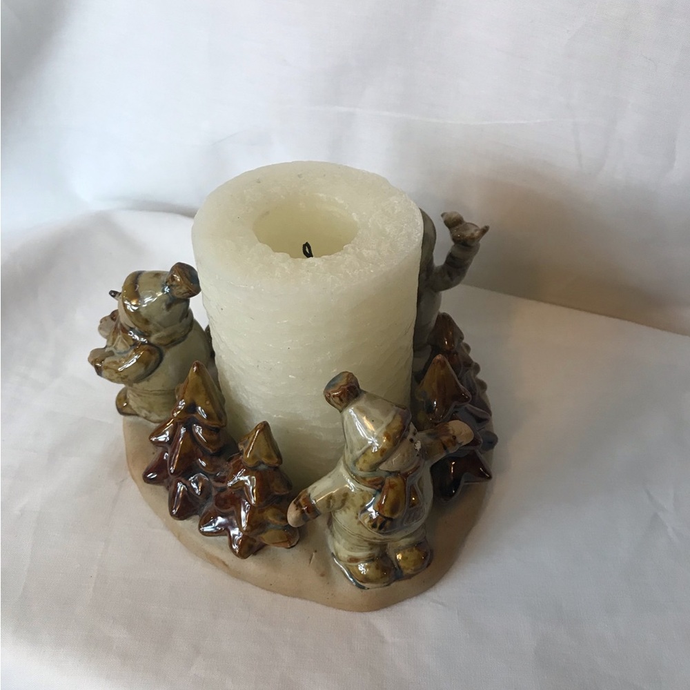 Snowman and pine trees holiday candle